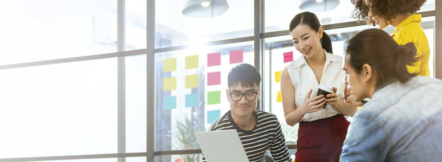 People working in a light office